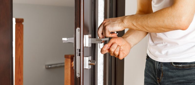man-repairing-doorknob (2)